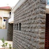 Basalt Rockfaced Tiles supplied by J.H. Wagner & Sons.