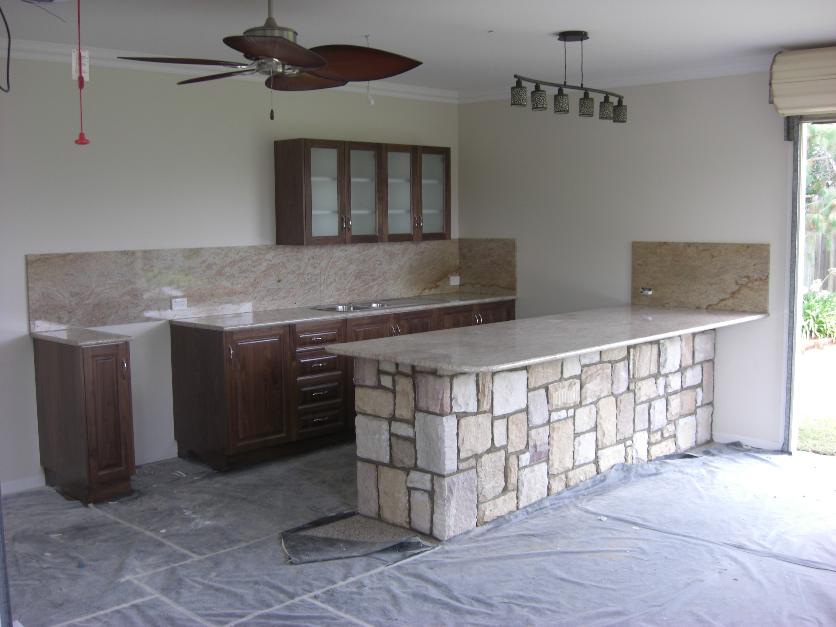 Granite bar top and Sandstone ashlar colonial walling from JHW