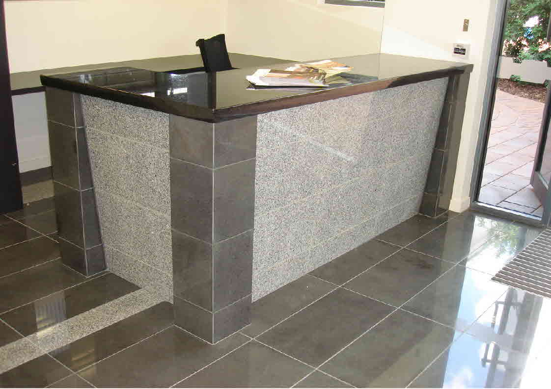 Black granite reception counter supplied by J.H. Wagner & Sons.